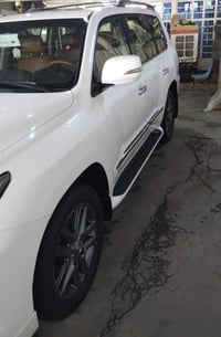 لكزز 2014 خليجي LX570 sport داخل قرميدي السيارة ماشية 180 الف جكات + ف...