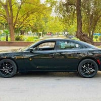 جارجر للبيع مديل ١٨ اصل رقم بغداد الجديد دولي بيه جاملغ وبنيد ارباك فق...