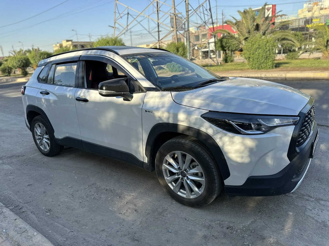 ‼️السلام عليكم كورلا كروس هايبرد محرك 2000للبيع موديل 25 ماشيه 13.500 كم  رقم بغداد الجديد سياره جديده حتى الارضيات بعدهن بلنايلون ومكفوله بيه فقط بارد على كد شبر بسيط جداً بلصندوك اثر طخه ستوته وسونار موجود 
 ‼️المواصفات 
 ⚠️داخل جلد احمر بلادي
⚠️زنون 
⚠️كامره دواره
⚠️رادار امامي 
⚠️ كروس سرعه وتحديد مسار
⚠️ راكات وكشافات بلاديه
⚠️فتحه
⚠️بصمه تشغيل وبصمه ابواب دخول ذكي 
⚠️شاشه ابل كار بلي واندرويد اوتر وايرلس
⚠️قطعتين تبريد 
⚠️الارضيه مغلفه جلد 
⚠️ ايرباك و abs وبريك تلقائي 
⚠️هاند بريك دكمه
⚠️ اوتو هولد
⚠️تبريد بيانو 
⚠️ 4 جام اوتو
⚠️ مانع انزلاق
⚠️ 3 وضعيات قياده
‼️سعر السياره 26 مليون وبيها مجال بسيط للشراي مكانها بغداد الغزاليه 💢 رقم الهاتف : ***********
