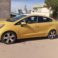 كيا ريو • ٢٠١٣ • فرش جلد