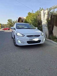 اكسنت موديل 15 خليجي ماشيه ٨٧ حقيقي رقم بغداد انكليزي بأسمي .. محرك ١٦...