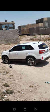 سورنتو مديل 14محرك 2400رقم بغداد بسمي 7راكب 3تبريد ب130بيها مجال 07733...