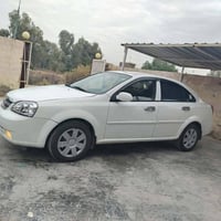 سياره وبتره 2005 خليجي جاهزه من كلشي مكنيه كير حداديه تخم تاير كهربائي...