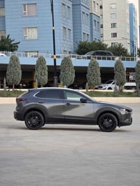 Mazda CX30 2024 AWD  ڕەنگی نەوتی مواسەفات  Select sport مەکینە ٢.٥ بێ ...
