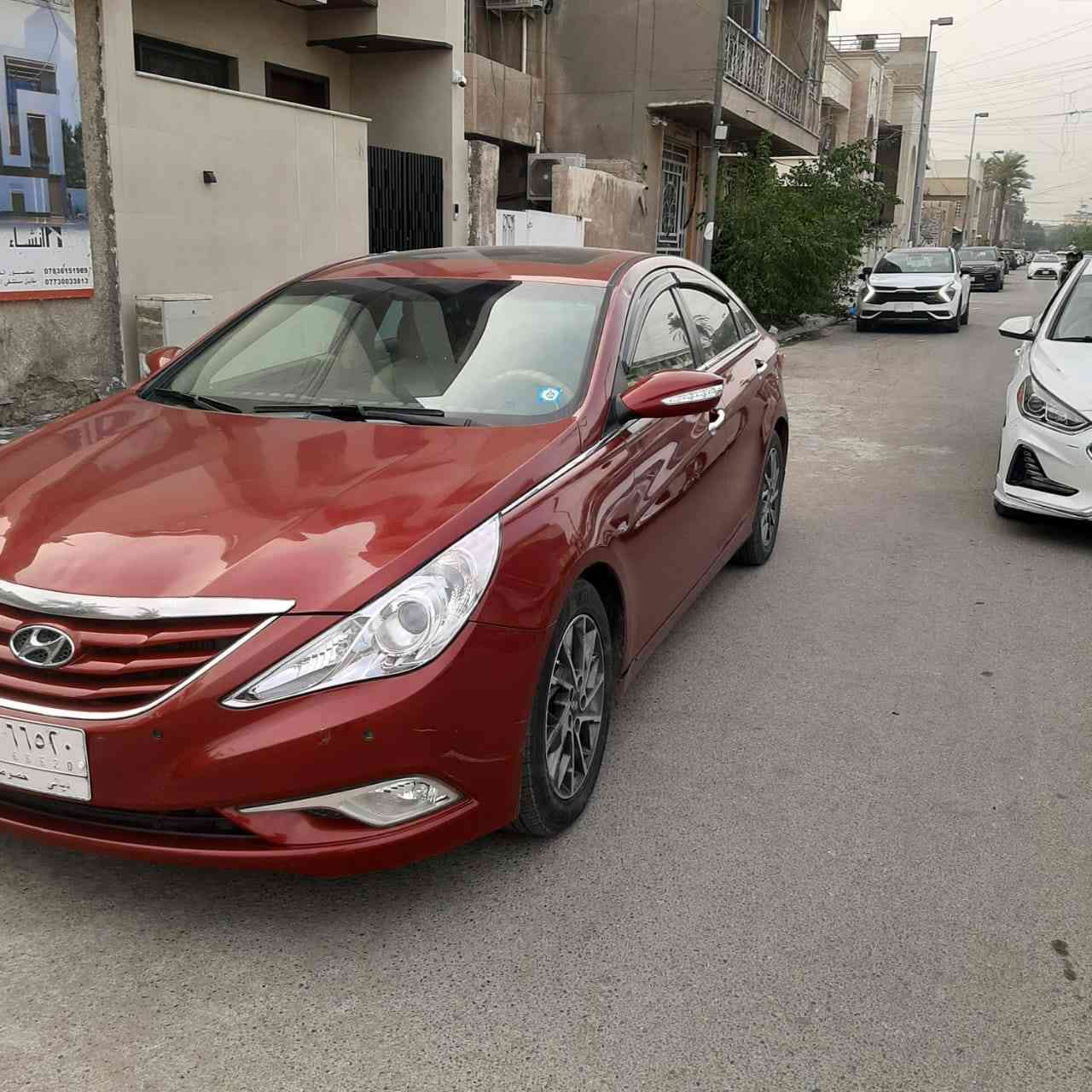 هونداي سوناتا موديل 2013 وارد امريكي  رقم ديالى ظررها بنيد مبدل بدون دواخل باقي  السياره ليبل واحد وصار بيها صبغ وكلير مكانات اقل من الحزام بدون فتح او تبديل السياره لمتد فول مواصفات 1/1 بصمه وسلايد تبريد قطعتين كشنات جلد والسائق كهرباء تحكمات وشفتات استيرن وبعد بيها مواصفات المحرك والكير كفاله عامه تبريد ثلج غرفتها جديده مكانها بغداد الكريعات السعر 98 ورقه للاتصال *********** او ***********
