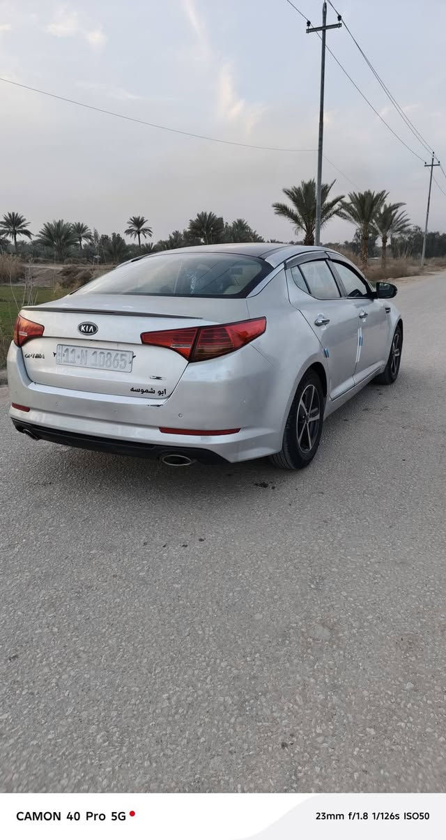 سلام عليكم كيه اوبتما 2013 وارد كوري سياره جديده مصبوغه حزام سياره جاهزه مكينه كير حداديه تخم تاير داخل كله جديد تبريد شغال سياره ستخدام شخصي فقط رقم بغداد جديد بسمنه الستفسار علا رقم ((***********))  ((***********)) والي ياخذها يدك سونار   مكينه 2000دوش مكاني حله سعر 95وبيها مجال
