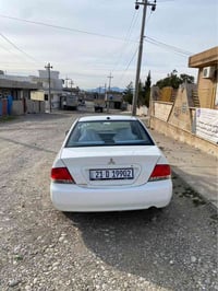 لانسەر مۆدێل ٢٠١١  مەکینە گچکەی گێر حادی ١٨٠ هەزاری هەقیقی ڕۆشتوە سارە...