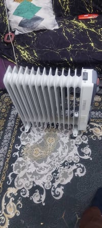 دفاية زيت • ١٣ ريشة • بغداد شعله