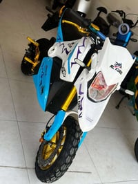 قفاز شحن (استعمال قليل جدا ) ملف ٢٠٠٠ ٦ باتري  سرعه ٨٥ شاشه إلكترونيه ...