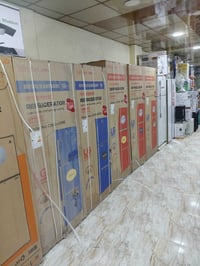 ثلاجة بابين فريزر علوي • كمبريسور LG • رويال رحمن