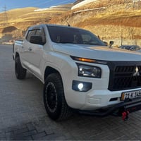 ميتسوبيشي • ٢٠٢٤ • ٢٦٠٠٠ كم