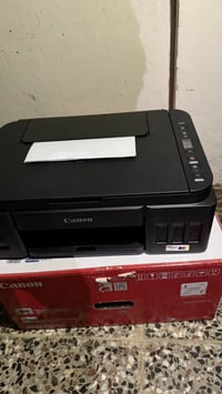 طابعة كانون اصلية بعدها بالباكيت جديده السعر 100 تواصل خاص او واتساب 0...