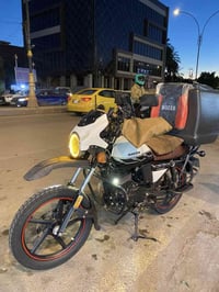 دراجه دايوان موديل ٢٣ رقم بغداد بأسمي تحويل ثاني يوم  مبدل بيها بوشه و...