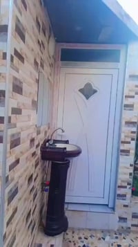 دار معروض للبيع قطاع الأول بناء حديد مساحه 150  07511230204