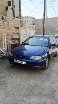 كية  مديل  2000 لون مميز جويتي رقم بغداد دولي شرط التحويل السيارة جاهز...