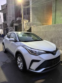 تويوتا CHR 2024 زيرو مرقم بغداد باسم المشتري فول مواصفات 1/1 محرك 2000...