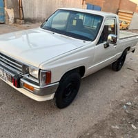 بيكم تيوتا موديل ١٩٨٨ رقم بغداد انكليزي بسمي وهزه جديده سنويه لغايه ٣٠...