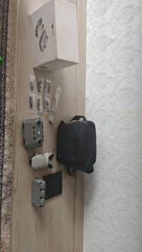 DJI mini 2 combo هه موو اشياي له گه له زور خاوینه ته نیا قه پاغی سه ره...