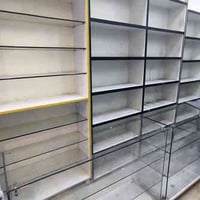 غراض محل كوزمتك للبيع رفوف عدد 7 خشب ووحده جام فاترينا عدد 2 جام سبلت ...