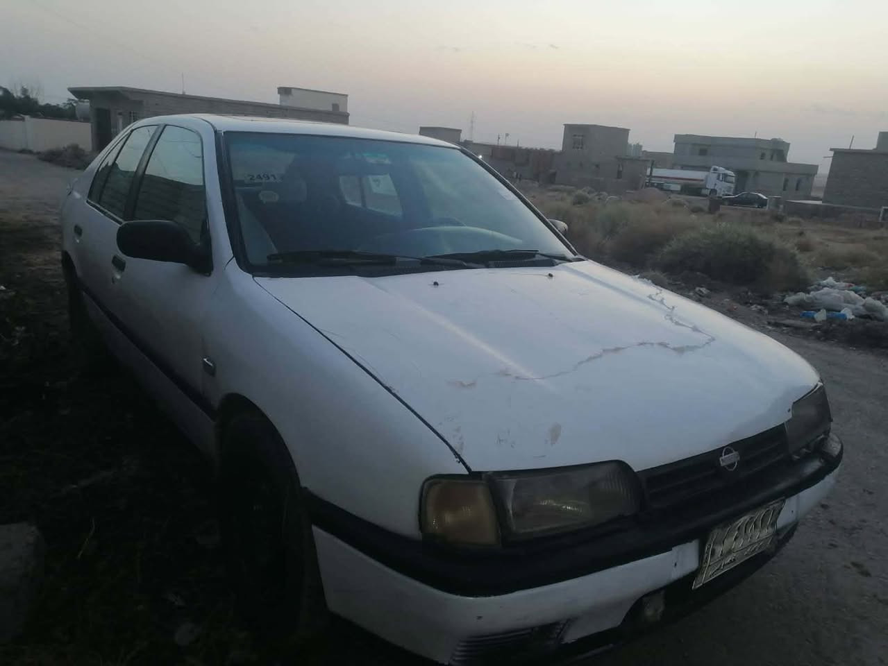 سلام عليكم نيسان 20موديل90رقم الماني مشروع وطني كير شرط ومحرك بي تبخير  السنوية صاقطه ب2020 تايرات فوك النص عمر ترايك لبصره السياره شوف العين نضيفه وجديده السعر26ورقه استفسار ‭٠٧٨٢ ٤٨٠ ٠٢٦٥‬
