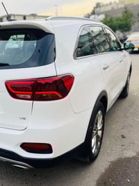 سورنتو 2019 كفاله عامة رقم بغداد بأسمي 6 سلندر  فول مواصفات عدا البانو...