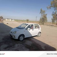 كيو كيو مديل 2008 رقم نكليزي بغداد  سنويه جديده وهزا جديده تحويل مباشر...