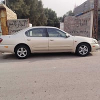 نيسان مكزمه موديل 2000مصبوغة جماليه مدون ضربه السعر 38مكاني بغداد المع...