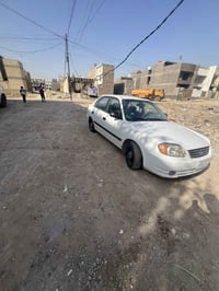 عدي اكسنت فيرنا موديل 2004 السياره بسمي رقم إنكليزي بغداد مكينه وكير خ...