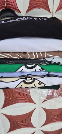 تيشيرت صيني • نقشات مختلفة • مقاسات M-XXL