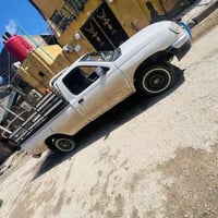 نيسان 2002سياره حلوه وجاهزه من كلشي اي نقص مابيهه محرك كير كسل كله شرط...