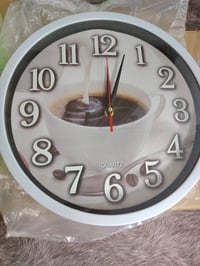 ساعة جداريه • ٣٠سم • ٤ ألوان