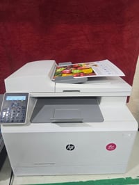 طابعة HP • ملون • سكانر