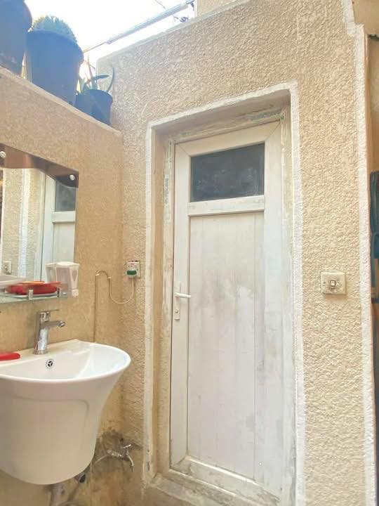 نصف قطعة للبيع قطاع ٣١مقابل جامع الحكمة ‭+964 773 950 9388‬
