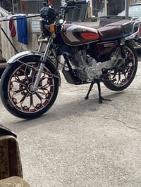 نامي هونزدا • ٢٠٠ • ٢٠٢٤