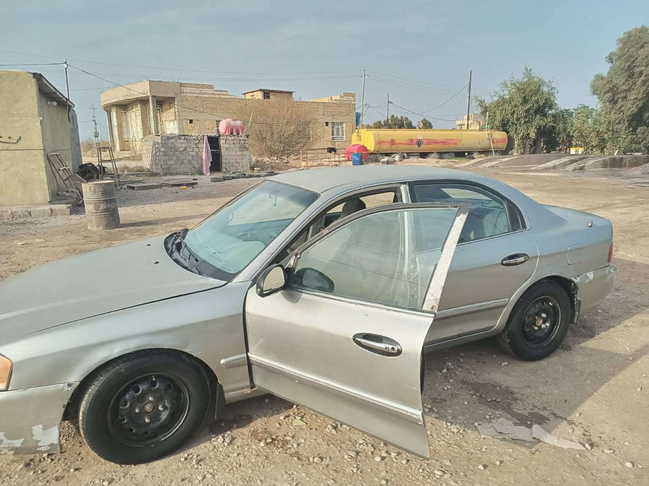 أوبتما 2004 محرك2000
رقم بغداد كير ومحرك وتبريد مكفول 
السعر 53 بيها مجال 
***********
