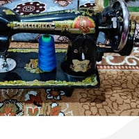 مكينة خياطة • أجهزة منزلية