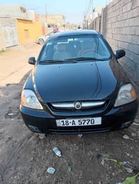 كيا ريو • ٢٠٠٥ • كير اوتو