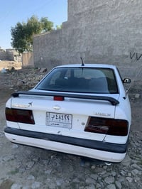 نيسان براميره للبيع موديل1993 محرك 2000  السعر 35   07819660862 واتساب...