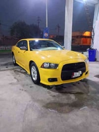 تشارجر ٢٠١٢ • أصفر • ضربة بالخلف