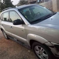 توسان رصاصي موديل ٢٠٠٧ بيهه صبغ جاملغ أمامي وجاملغ خلفي جهة السائق الس...