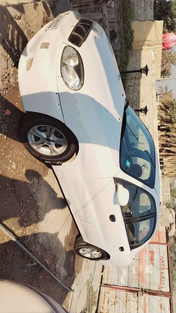 السلام عليكم ورحمة الله وبركاته دايو لانوس موديل 1996 رقم بابل باسمي سياره حلوه وخير من الله كير محرك حلوات لا تنقيص ولا تبخير صدرها كلش حلو   السعر ٣٥ وبيهه مجال العنوان بغداد المحموديه رقم الهاتف ***********
