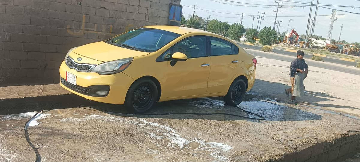 كيا ريو رقم بغداد دولي وارد امريكي محرك 1600  سعر ٨٠
