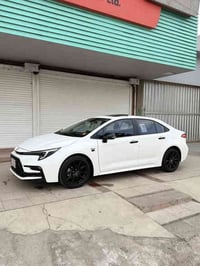 كورلا 2025  GRمحرك 1800 هايبرد HEV مري بلاك بلادي ويل بلاك كبير  ماشية...