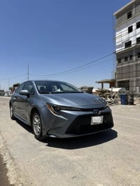 كورلا هايبرد + بانزين موديل 2022 فول مواصفات عدا الفتحة  عدسات ليد ليز...
