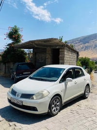 نیسان • تيدا • سيارة نيسان • تيدا مستعملة • سيارة عائلية • اربيل • سيا...