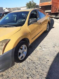 نيسان التيما  رقم بغداد مصفره   موديل 2012   كير مكينه كورله شرط لا تب...