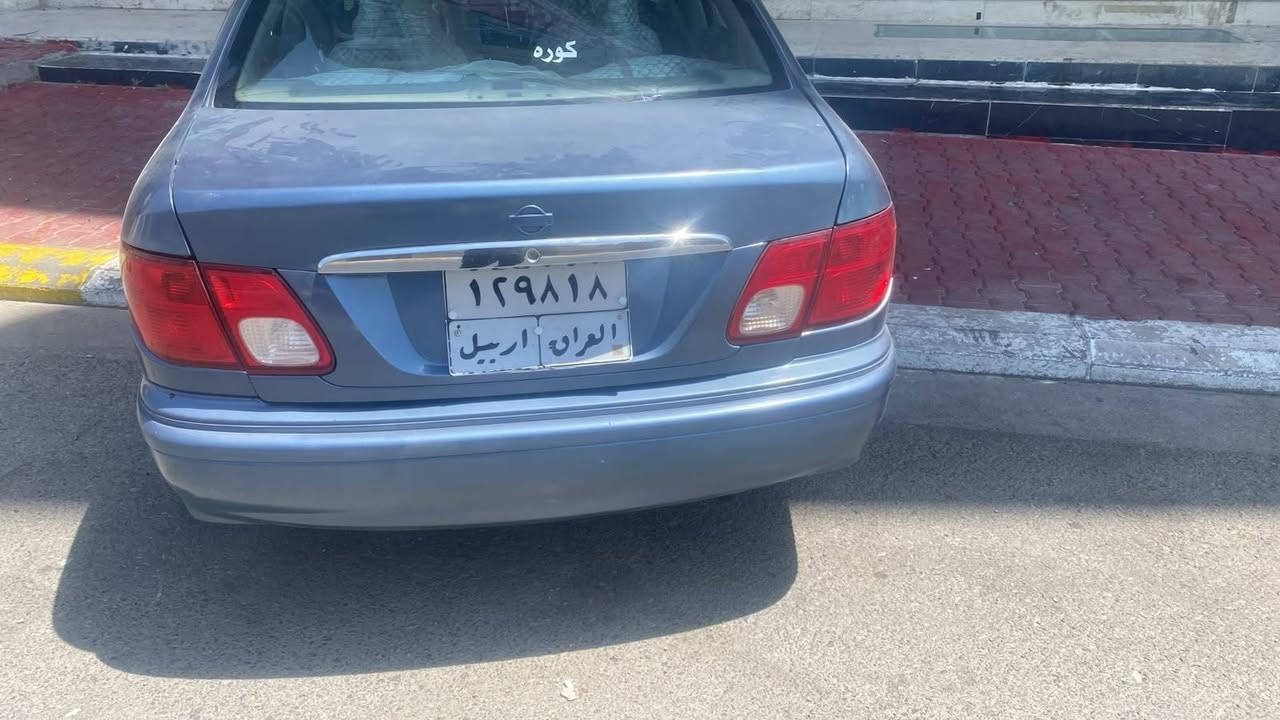 نیسان سەنی 2003 
ڕەقەم هەولێر قەسرینە 
بەشەرتی ئەوەلیات و تەواو.
گێڕ و مەکینە و کارەبایی بەشەرت 
زۆر توند و تۆڵە ماڵی فەقیرە  حیزام بۆیاخە بئ وەرگەڕان 
گۆڕینەوەش دەکەم لەسەر دڵگرتن . 
لە سلێمانیە سەیارەکە .
***********
*********** السليمانية, العراق
