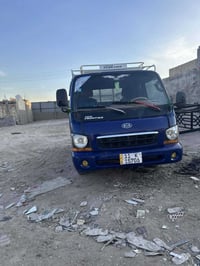 كيا موديل 2002 مكان بغداد المعامل سعر 68 جير ومكينه وشاصي مقفولات 0772...