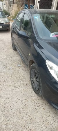 بيجو فرنسي ٢٠٠٦ السياره جاهزه مابيه ضربه كير محرك كله تمام  رقم بغداد ...