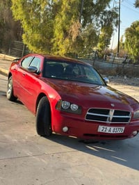 جارجر 2007 رقم سليمانيه  محرك و راديتر و تخم تايرات و صدر امامي وخلفي ...